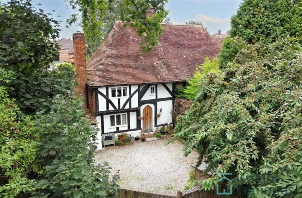 an overhead view of a white and black house at The Buttery in Maidstone