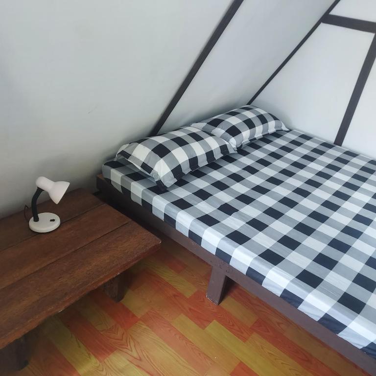 Postel nebo postele na pokoji v ubytování 3B Resort