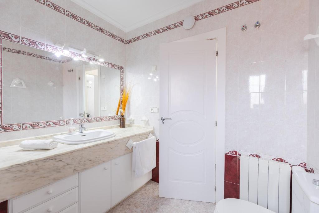 Kúpeľňa v ubytovaní Fidalsa White House Premium