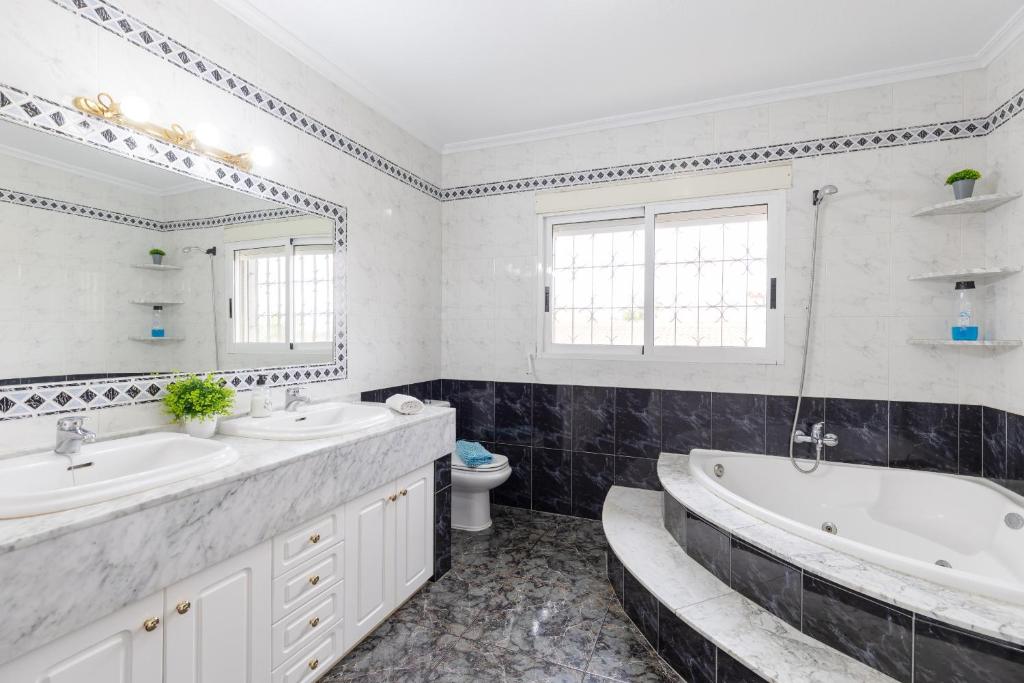 Kúpeľňa v ubytovaní Fidalsa White House Premium