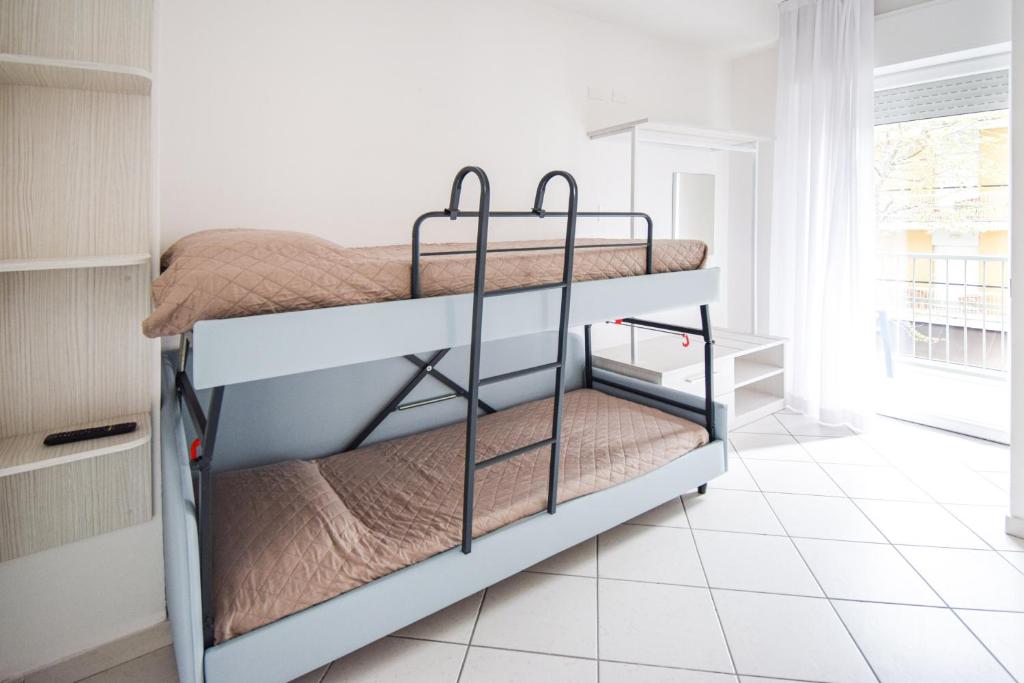 Postel nebo postele na pokoji v ubytování Hotel Giulio Cesare