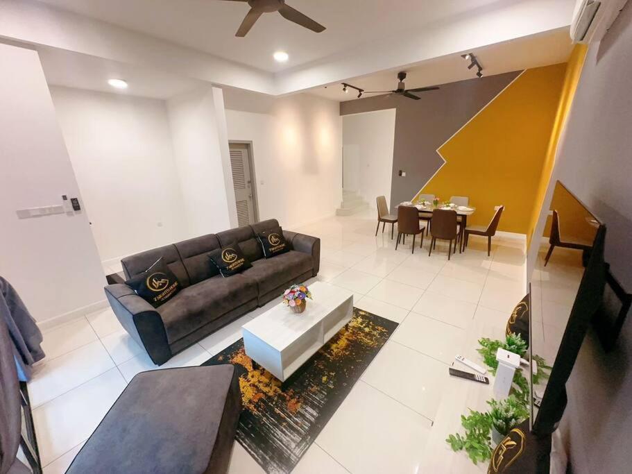 a living room with a couch and a table at A18 Tebing Dato Onn 39 in Johor Bahru