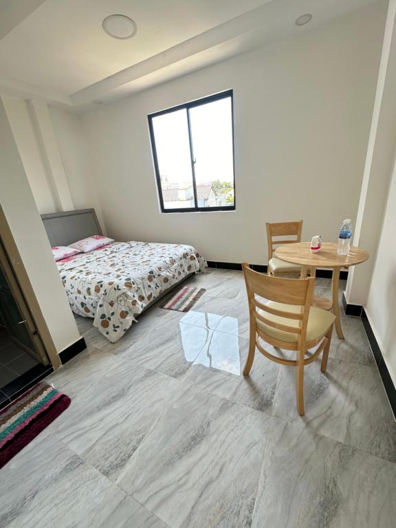 Postel nebo postele na pokoji v ubytování Peaceful Homestay