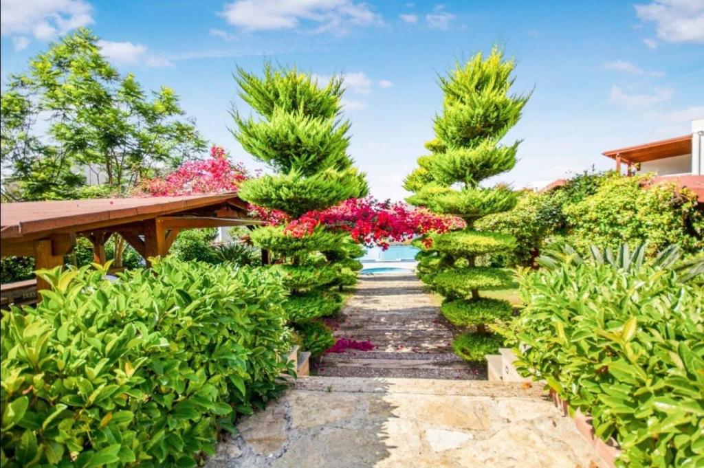Zahrada ubytování Dibek Homes Villa & Hotel