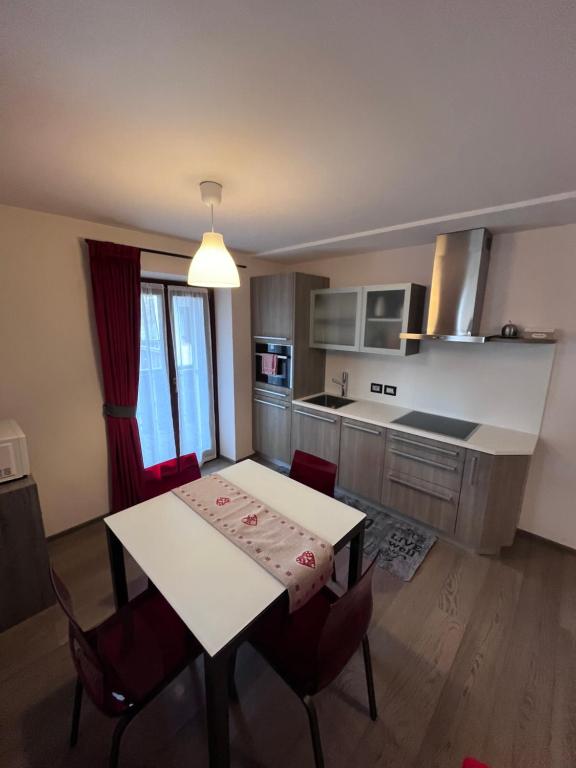 A kitchen or kitchenette at Dolomites Holiday Home