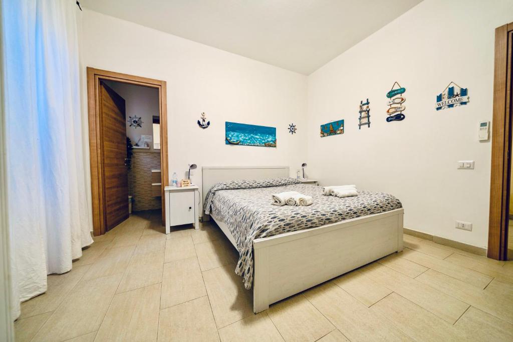 a bedroom with a bed in a room at Il Poggetto di Porto Ercole in Porto Ercole