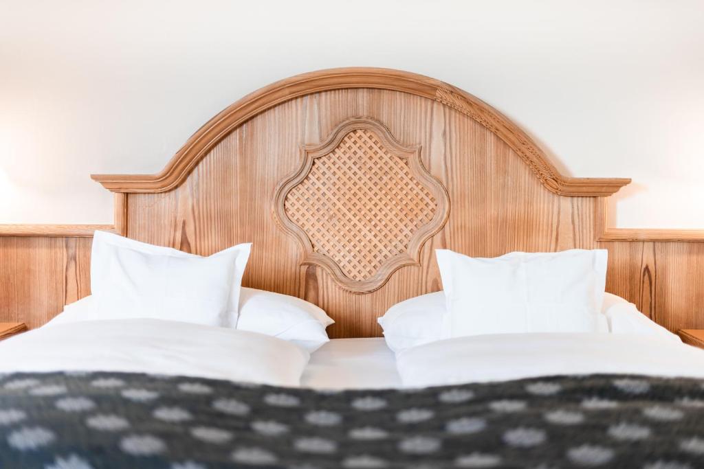 Postel nebo postele na pokoji v ubytování Naturhotel Leitlhof
