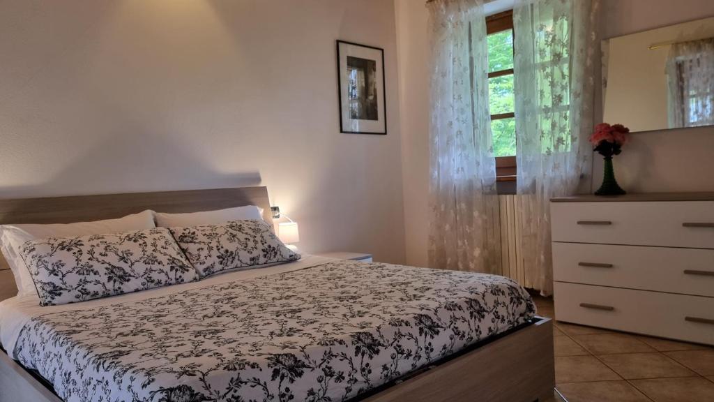 Postel nebo postele na pokoji v ubytování Agriturismo Pastorelli