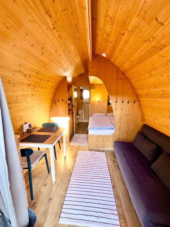 Postel nebo postele na pokoji v ubytování Hüttendorf Fränkische Schweiz