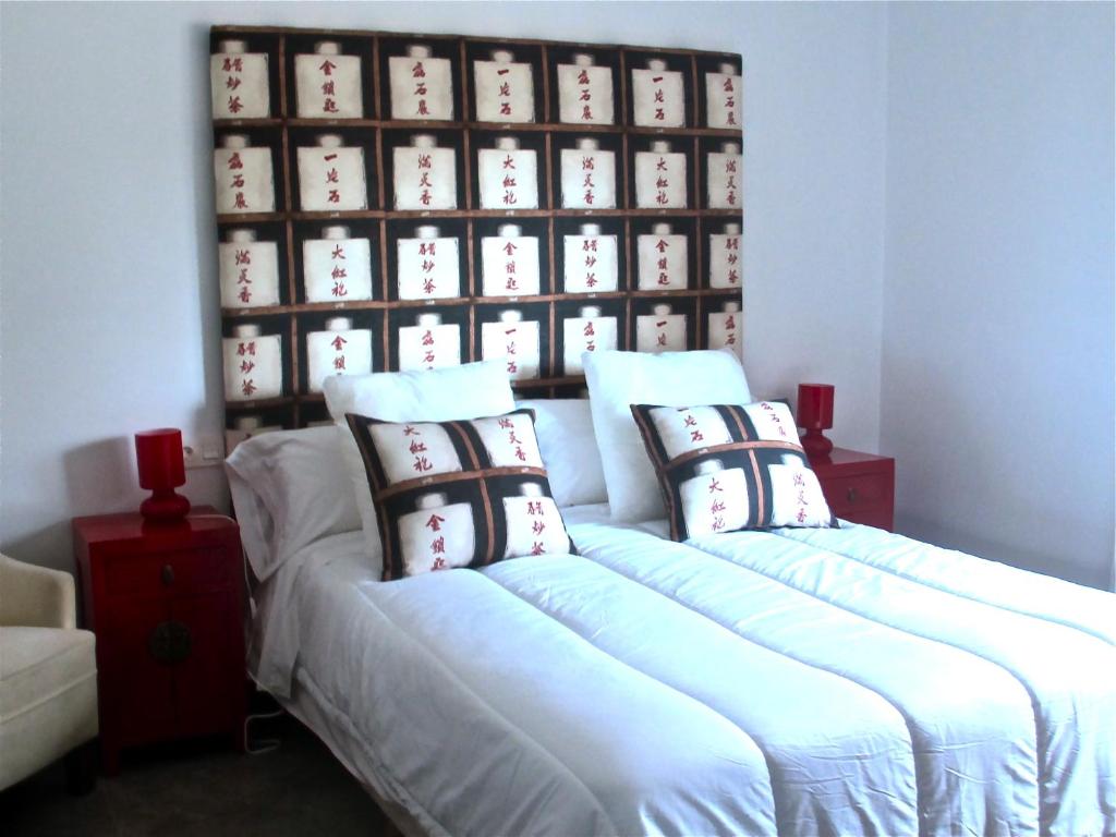 A bed or beds in a room at El Sosiego