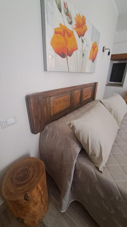 Posteľ alebo postele v izbe v ubytovaní B&B Le Vie del Borgo