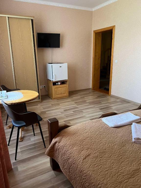TV a/nebo společenská místnost v ubytování Mini-Hotel "Nord"