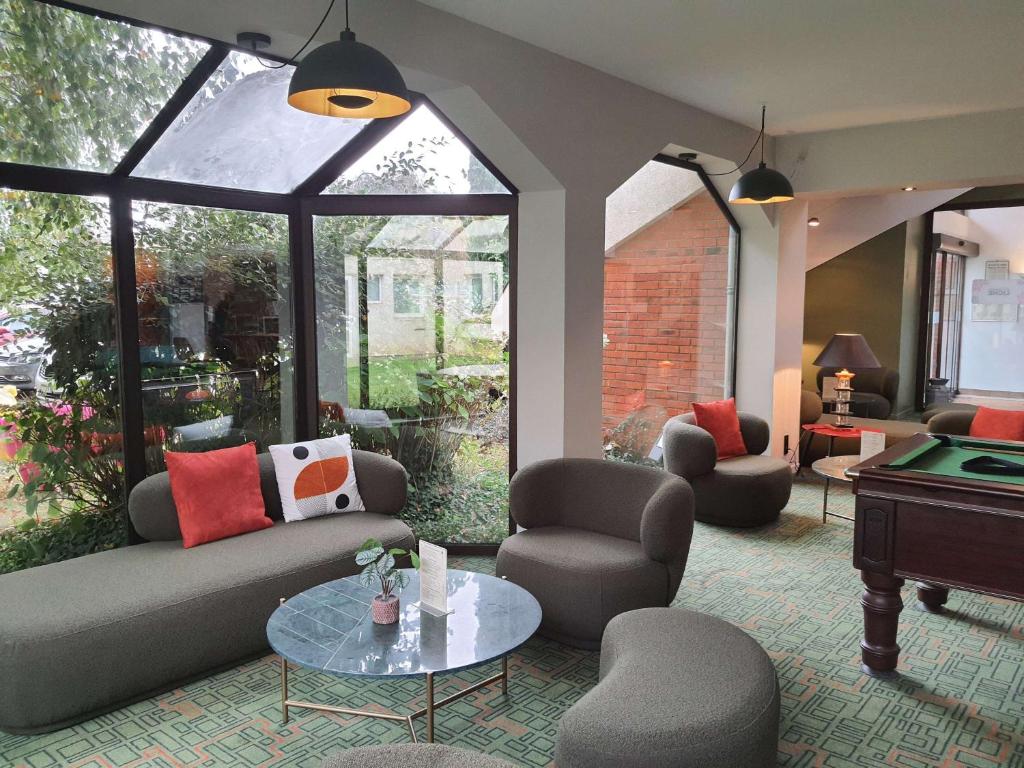 Posezení v ubytování Ibis Styles Lisieux Normandie