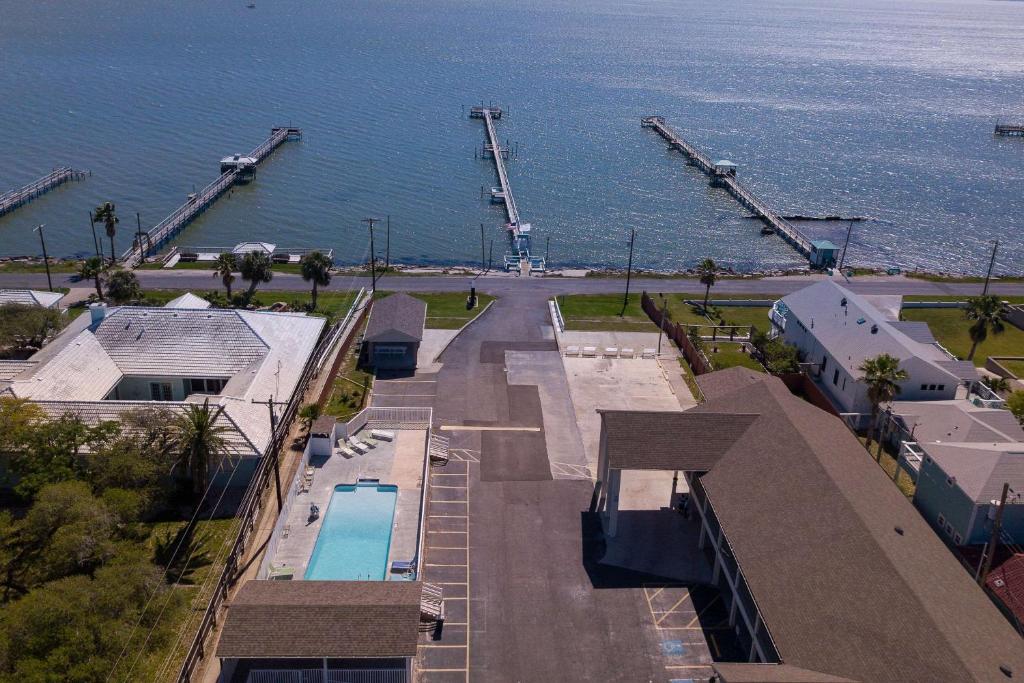 an overhead view of a building with the ocean in the background at Quality Inn Rockport on Aransas Bay in Rockport