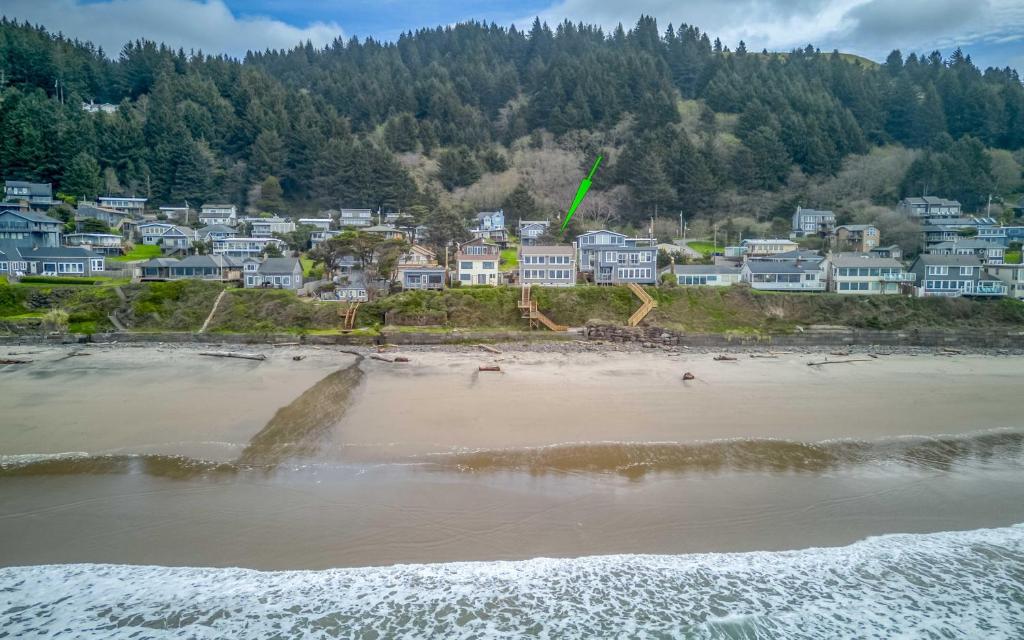 an aerial view of a beach with a town at DaySea Cottage in Lincoln City