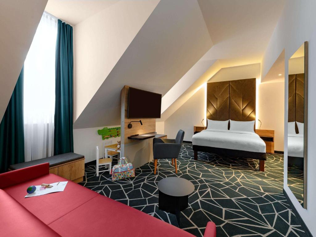 Postel nebo postele na pokoji v ubytování Ibis Styles Aschaffenburg
