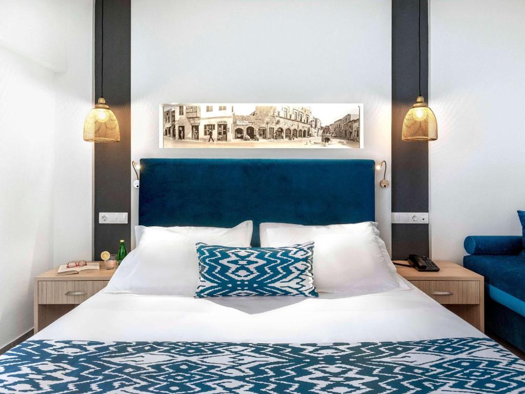 Postel nebo postele na pokoji v ubytování Mercure Rhodes Alexia Hotel & Spa
