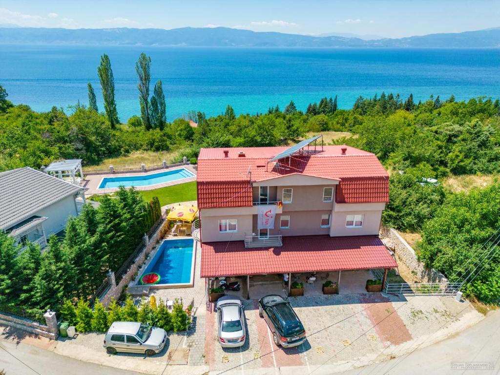 an aerial view of a house with a swimming pool at Villa Tesla in Ohrid