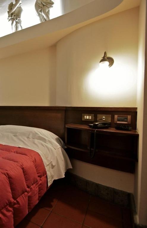 Postel nebo postele na pokoji v ubytování Hotel Panda