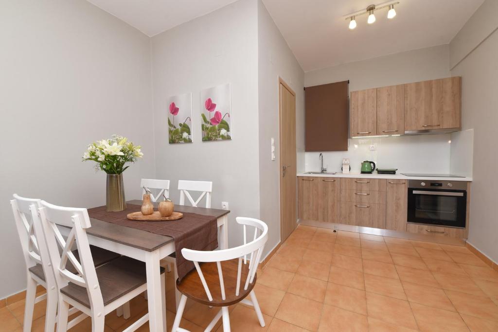 Kuchyň nebo kuchyňský kout v ubytování Cyclamen Apartments