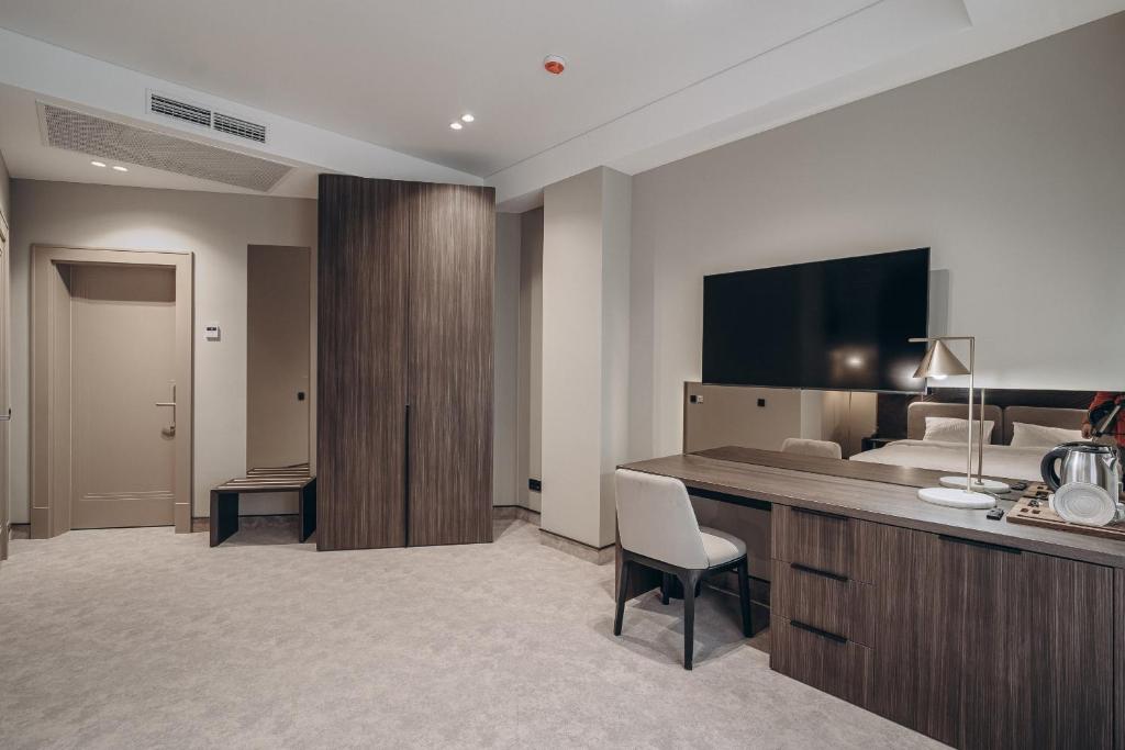 TV a/nebo společenská místnost v ubytování Park Hotel Bristol