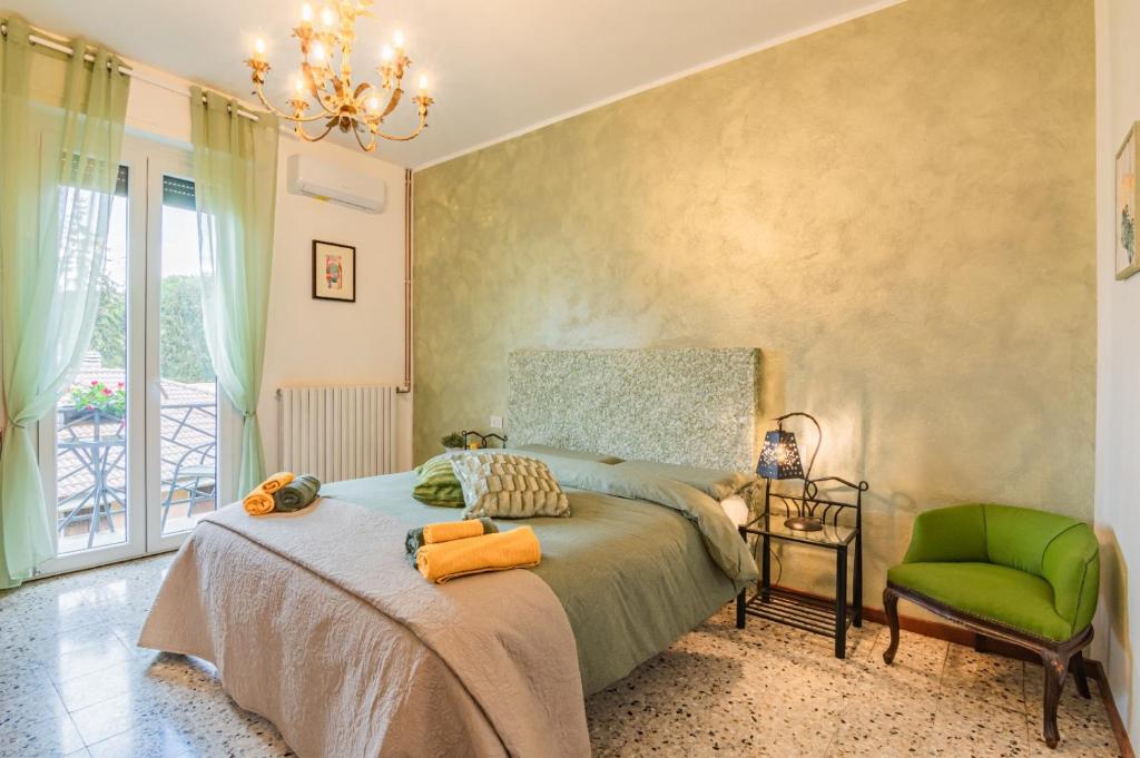 Postel nebo postele na pokoji v ubytování All Ulivo
