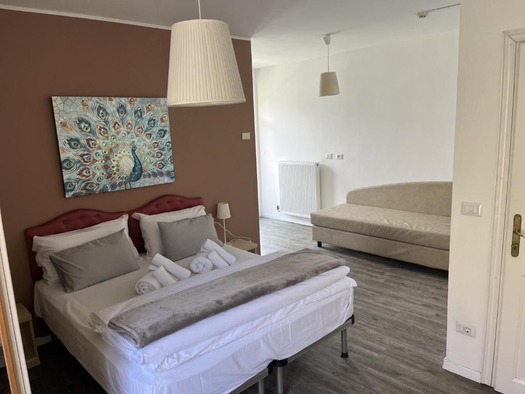 Ένα ή περισσότερα κρεβάτια σε δωμάτιο στο Hotel Lido