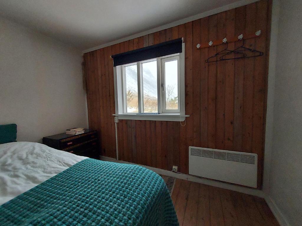 Rúm í herbergi á Guesthouse Nýp
