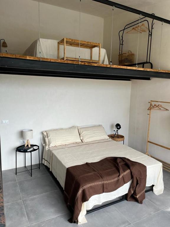 Postel nebo postele na pokoji v ubytování Villa Calimma