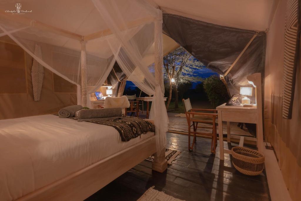 Letto o letti in una camera di Mara Major Camp