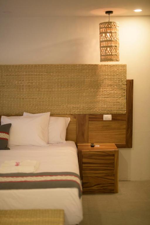 Postel nebo postele na pokoji v ubytování Punta Agave Suites