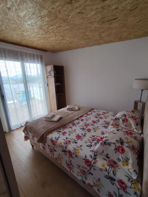 Łóżko lub łóżka w pokoju w obiekcie Apartment Sorelle