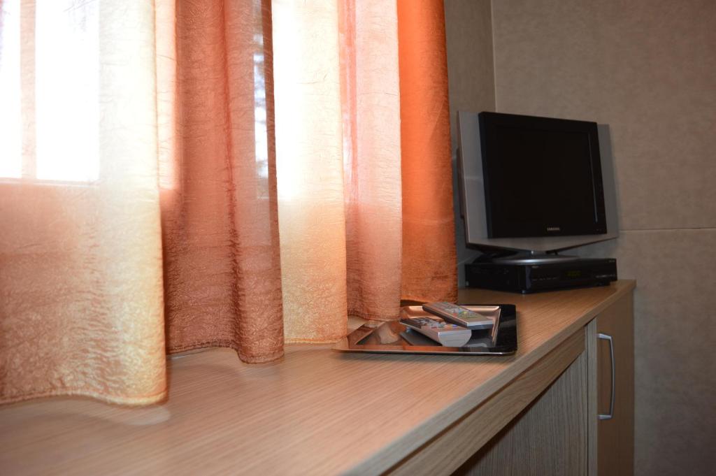 TV a/nebo společenská místnost v ubytování Camping Royal
