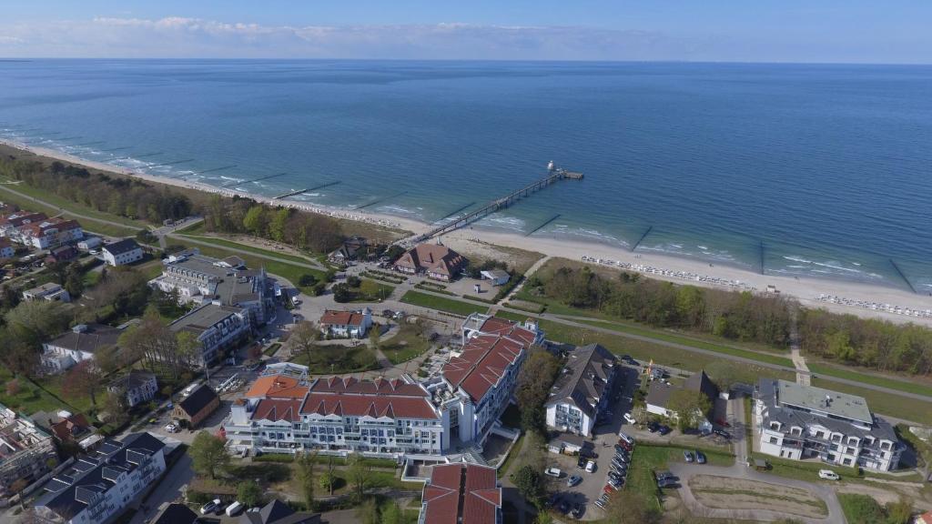 an aerial view of a beach with a crane at ZingstUrlauber in Zingst