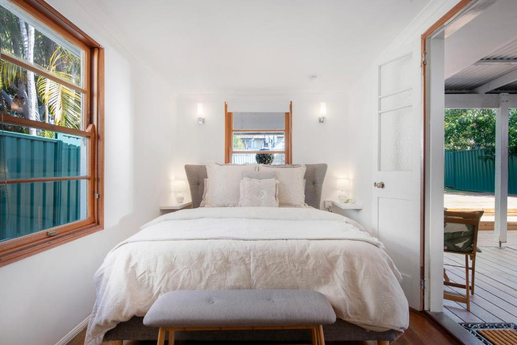 Un pat sau paturi într-o cameră la The Mellow Haven