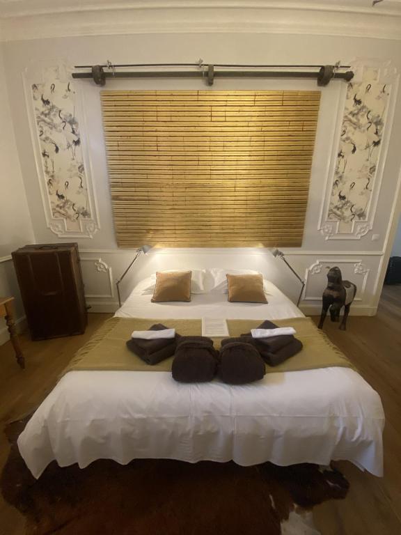 Letto o letti in una camera di The Museum - Au Lit, Jérôme!