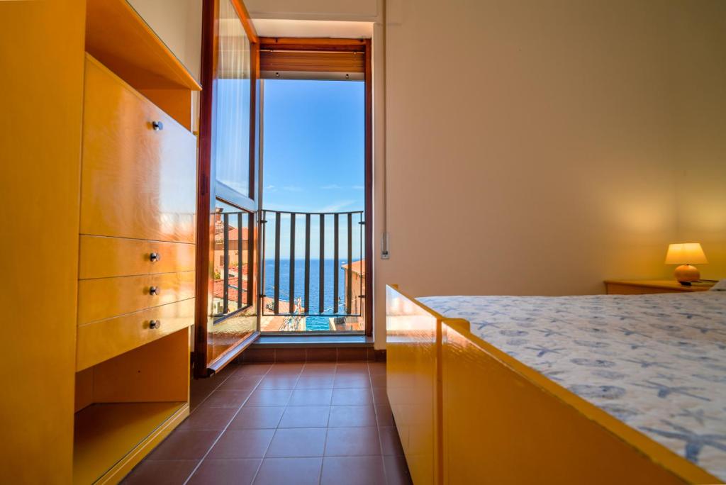 Postel nebo postele na pokoji v ubytování Hotel Da Ruggero - 100m dal Porto