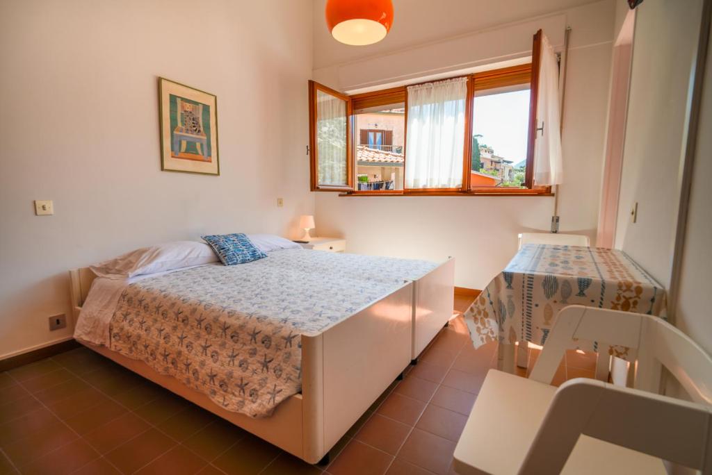 Postel nebo postele na pokoji v ubytování Hotel Da Ruggero - 100m dal Porto