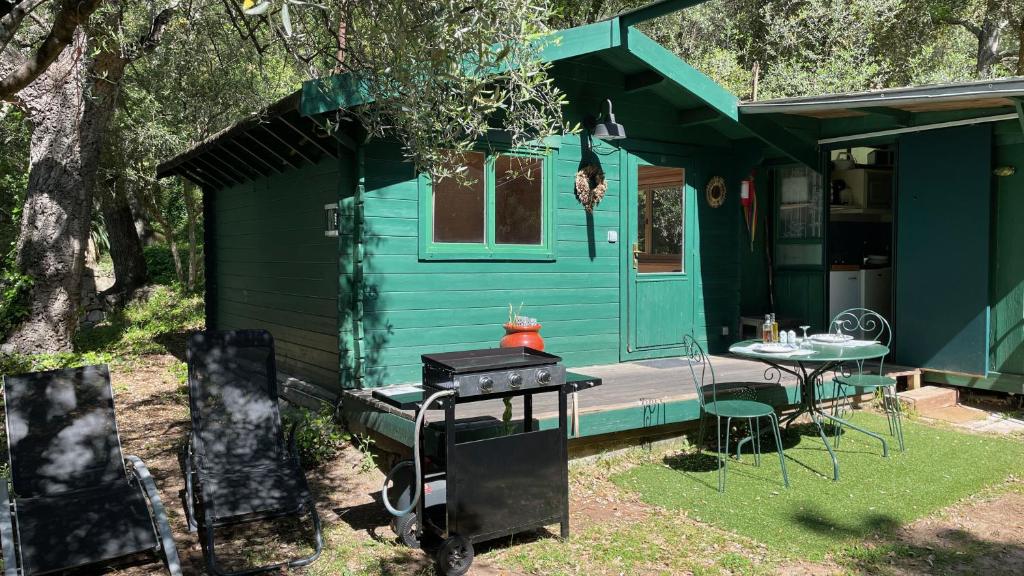 Zahrada ubytování Chalet avec piscine privée dans la forêt