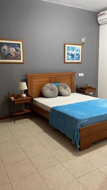 Postel nebo postele na pokoji v ubytování Felicidade Hotel