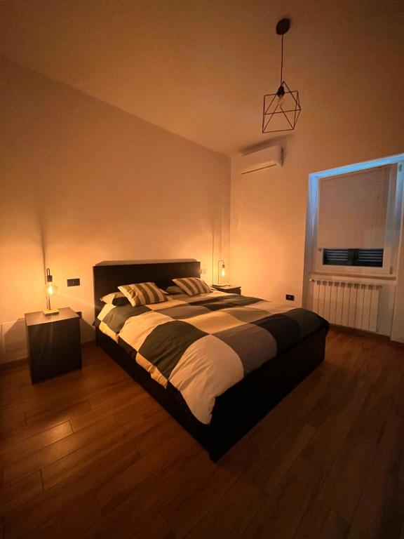 Ένα ή περισσότερα κρεβάτια σε δωμάτιο στο Alloggio Largo Consalvi Tuscania