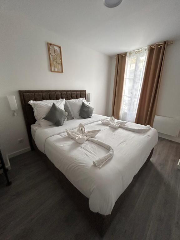 Voodi või voodid majutusasutuse HOTEL FORMIO toas