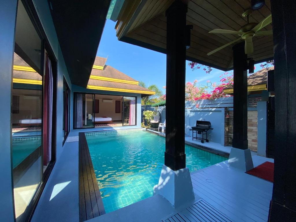 an image of a swimming pool in a villa at Lris villas in Phuket Town