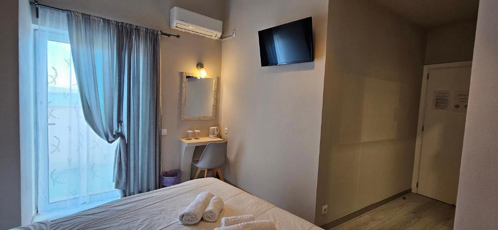 Postel nebo postele na pokoji v ubytování Hotel Diana