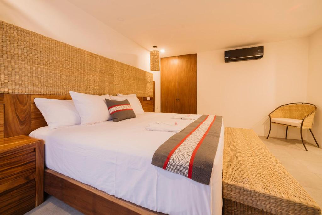 Postel nebo postele na pokoji v ubytování Punta Agave Suites