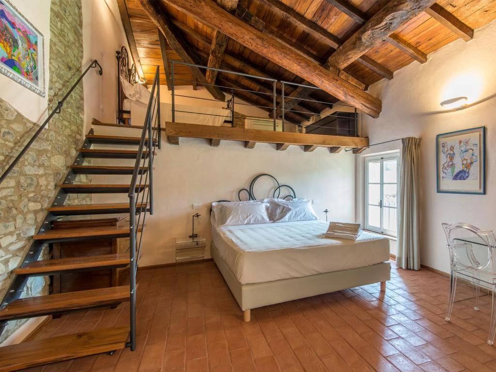 Postel nebo postele na pokoji v ubytování Borgo Cadonega