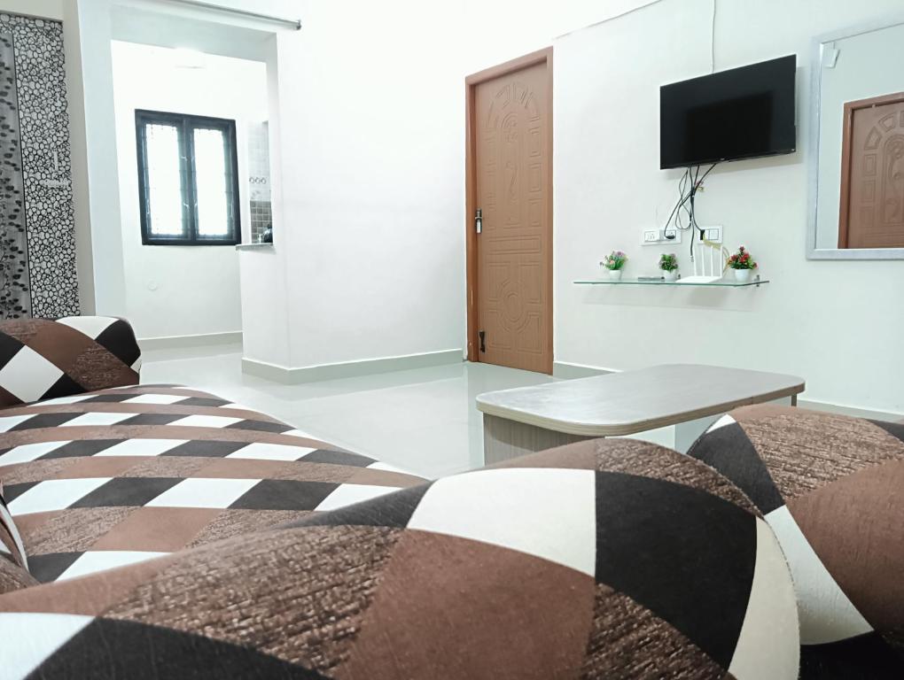 Postel nebo postele na pokoji v ubytování Rose Villa
