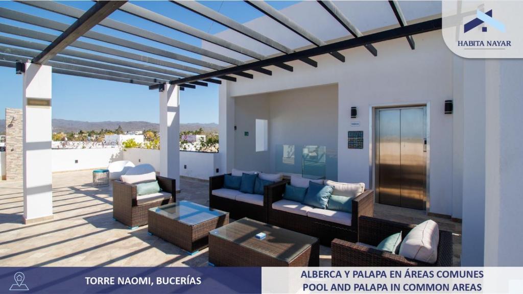 Un lugar para sentarse en Hermoso Departamento Vista Al Mar