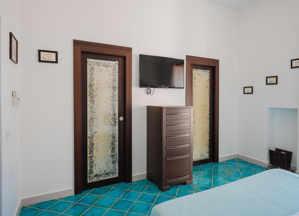 Postel nebo postele na pokoji v ubytování La Canostra Capri - luxury ROOM ad Anacapri
