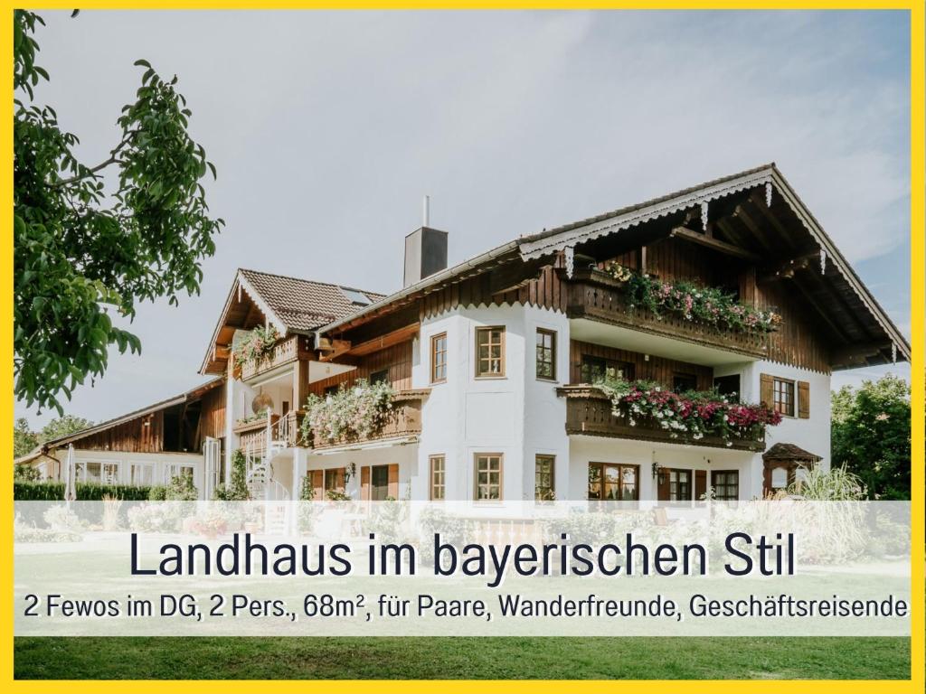 a house in bavaria with the text landlords in bavarian silt at Ferienhaus Bauer in Piding in Piding